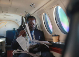 File image of Raila Odinga reading the Star newspaper